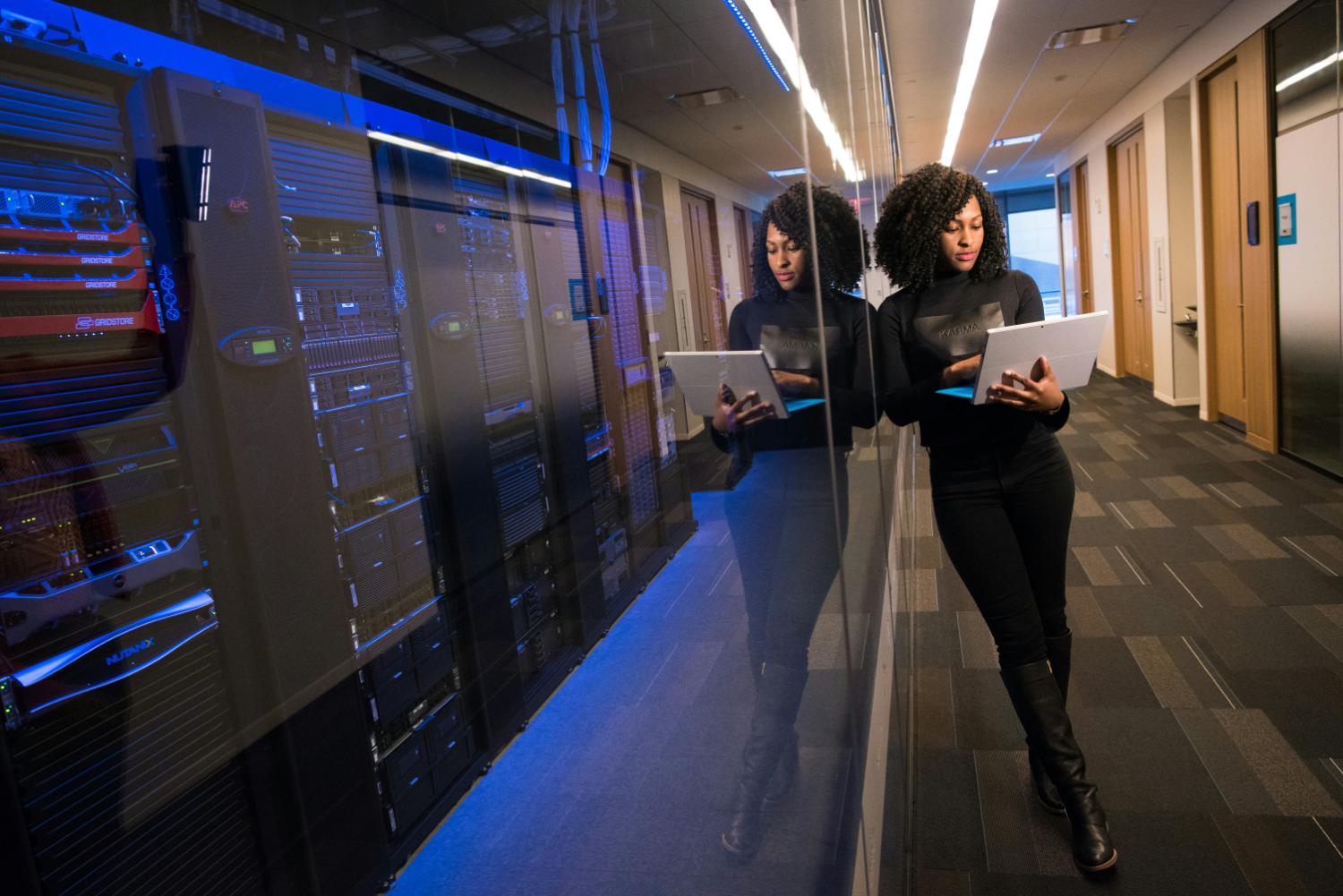 Engineers in datacenter corridor